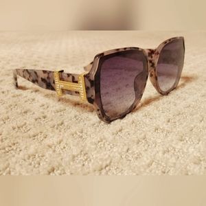 Grey leopard Hermes sunglasses